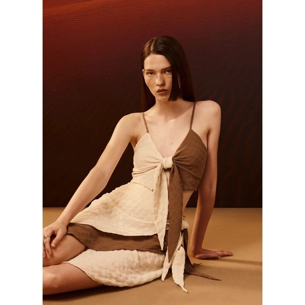Twist bow top